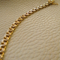 Double link solid 18k gold bracelet 1972 Swedish vintage, 18K gold, 7 inch in inside circumference, a chunky 17.8 grams, perfect working clasp, fully hallmarked, sun catching radiant double link, GORGEOUS!!!! She is a classic you'll wear every day. 18k Yellow gold with a subtle warm rosy tint - stunning. This link type is called a double-link. Pairs of links run side by side - like two curb chains delicately soldered, link by link, to form a double length of links.