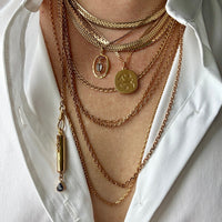 Victorian era Oval Pendant with Pale Blue Faceted Stone set in 18k Gold, Signed