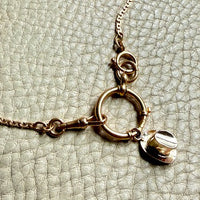 18k Gold antique bolt ring jewelry clasp on a chain