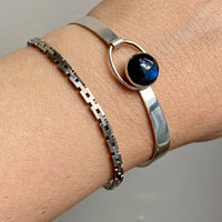Finnish Vintage Sterling Silver Bangle with Spectrolite Cabochon Clasp -Pertti Hakuli for Kaunis Koru - 6.75 inch interior