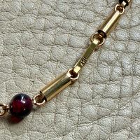 clasp detail vintage 18k gold and garnet long station necklace