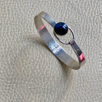 Finnish Vintage Sterling Silver Bangle with Spectrolite Cabochon Clasp -Pertti Hakuli for Kaunis Koru - 6.75 inch interior