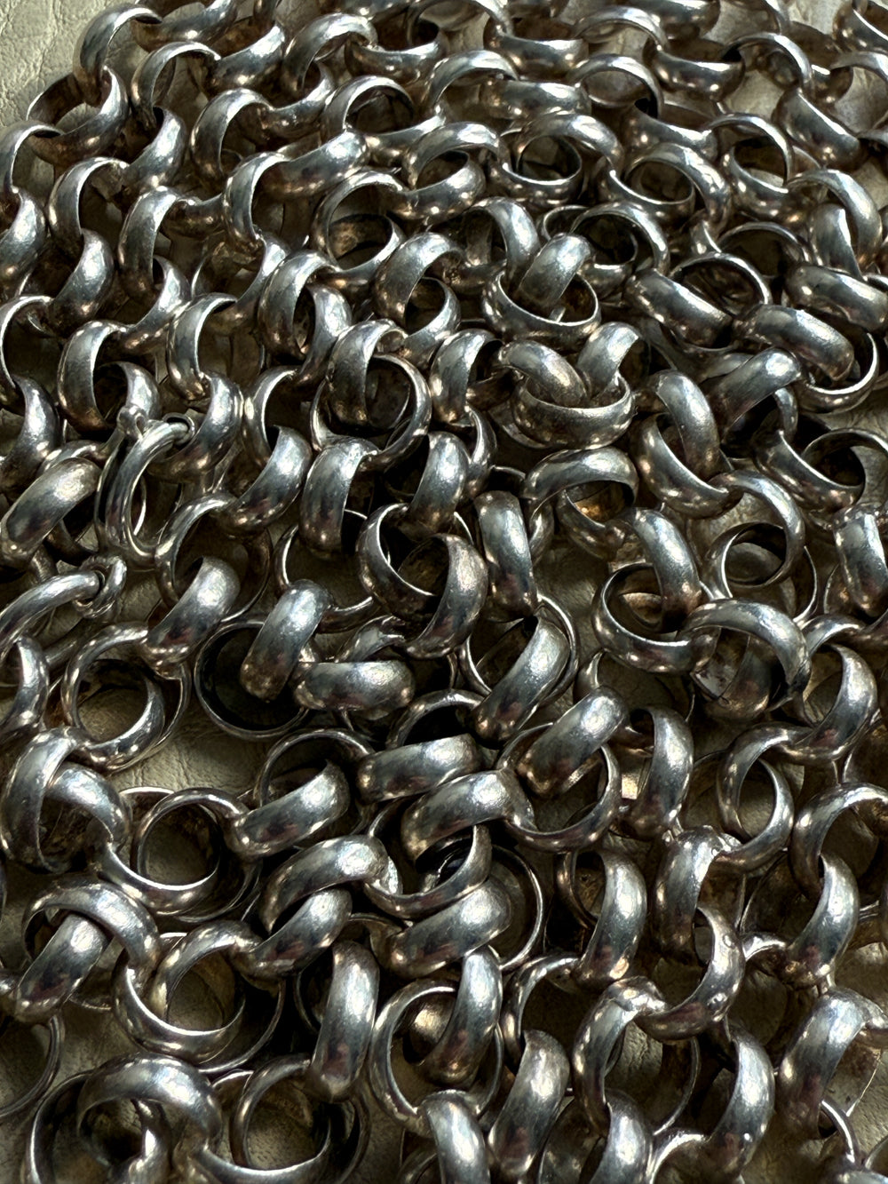 Close-up of a pile of silver chain links