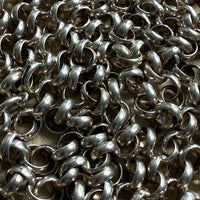 Close-up of a pile of silver chain links