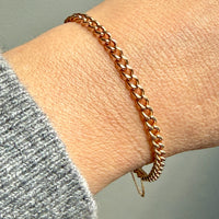 antique 18k Rose gold chain bracelet on a wrist