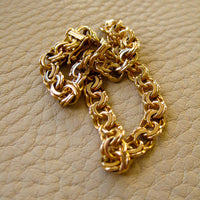 Double link solid 18k gold bracelet 1972 Swedish vintage, 18K gold, 7 inch in inside circumference, a chunky 17.8 grams, perfect working clasp, fully hallmarked, sun catching radiant double link, GORGEOUS!!!! She is a classic you'll wear every day. 18k Yellow gold with a subtle warm rosy tint - stunning. This link type is called a double-link. Pairs of links run side by side - like two curb chains delicately soldered, link by link, to form a double length of links.