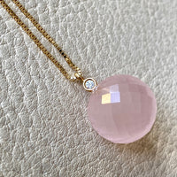 Sparkling! Rose quartz faceted orb pendant necklace set in 18k gold with 0.05 ct brilliant cut diamond by Ole Lynggaard