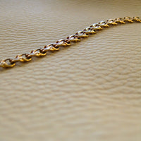 Double link solid 18k gold bracelet 1972 Swedish vintage, 18K gold, 7 inch in inside circumference, a chunky 17.8 grams, perfect working clasp, fully hallmarked, sun catching radiant double link, GORGEOUS!!!! She is a classic you'll wear every day. 18k Yellow gold with a subtle warm rosy tint - stunning. This link type is called a double-link. Pairs of links run side by side - like two curb chains delicately soldered, link by link, to form a double length of links.