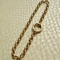 Vintage Gold Rolling Chain Bracelet 14k – 6.7 Inch Length on beige background