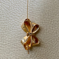 1946 Vintage Bow Shaped Brooch in 18k gold - Stockholm, Sweden by Stigbert
