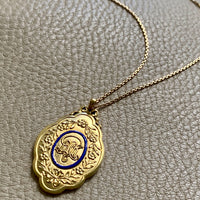 1928 Detailed 18k gold medallion pendant with blue enamel “For 21 years of faithful service”