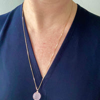 Sparkling! Rose quartz faceted orb pendant necklace set in 18k gold with 0.05 ct brilliant cut diamond by Ole Lynggaard