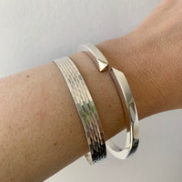 Heavy 46g Modernist Danish sterling silver bangle with gold tips