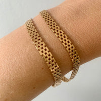 1954 Silky brick link 18k solid gold bracelet - Stockholm, Sweden Swedish vintage from 1954, 18K gold, 7.25 inch inside circumference, hidden box clasp, fully hallmarked. This bracelet moves like liquid gold. The link type is called a brick link in that the individual solid gold links are stacked in alternating straight lines, like bricks in a wall. Links are flat and the most comfortable to wear.