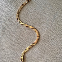 1954 Silky brick link 18k solid gold bracelet - Stockholm, Sweden Swedish vintage from 1954, 18K gold, 7.25 inch inside circumference, hidden box clasp, fully hallmarked. This bracelet moves like liquid gold. The link type is called a brick link in that the individual solid gold links are stacked in alternating straight lines, like bricks in a wall. Links are flat and the most comfortable to wear.