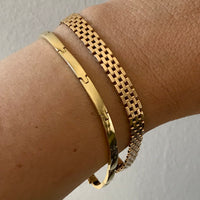 1954 Silky brick link 18k solid gold bracelet - Stockholm, Sweden Swedish vintage from 1954, 18K gold, 7.25 inch inside circumference, hidden box clasp, fully hallmarked. This bracelet moves like liquid gold. The link type is called a brick link in that the individual solid gold links are stacked in alternating straight lines, like bricks in a wall. Links are flat and the most comfortable to wear.