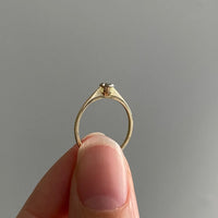 Finnish 18k gold ring with tiny brilliant cut diamond in flower setting- size 5