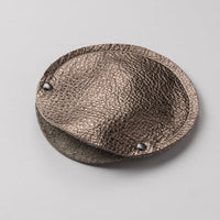 Metallic bronze leather circular cable case