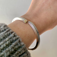 Heavy 46g Modernist Danish sterling silver bangle with gold tips
