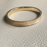 A beauty! 14k gold textured hinged bangle bracelet