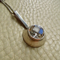 Vintage Swedish Rock Crystal Pendant Necklace Sterling Silver – 20 Inch Length on beige background
