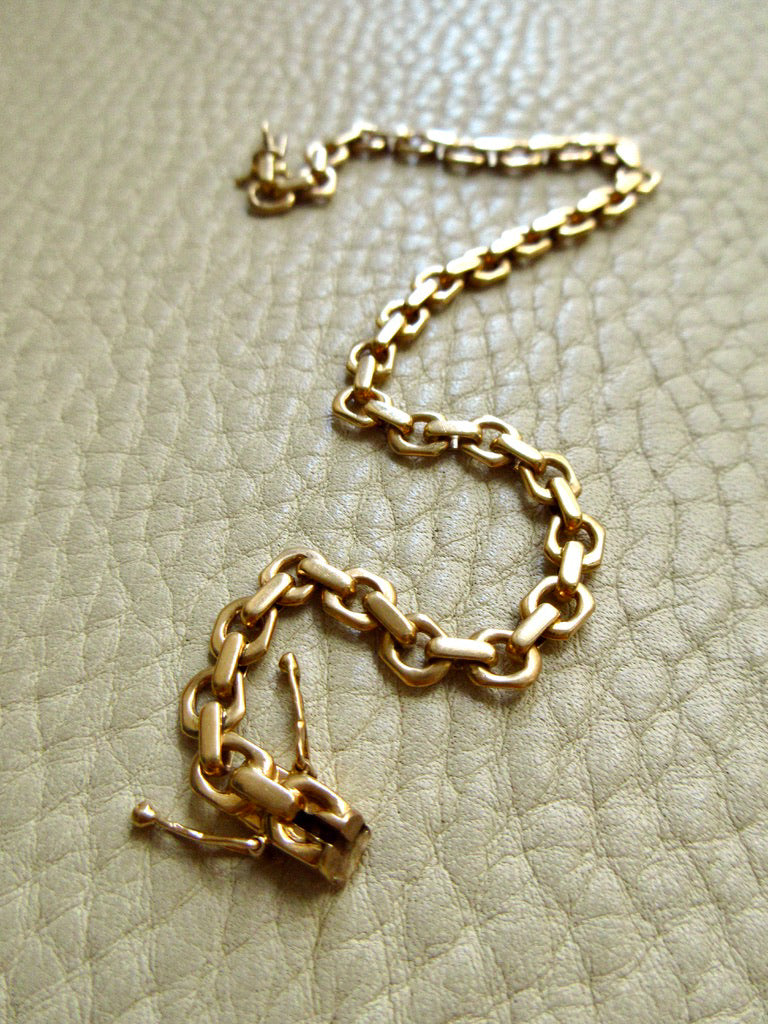 1950 Swedish Vintage Biker Link Bracelet 18k Gold – 8.1 Inch Length on beige background