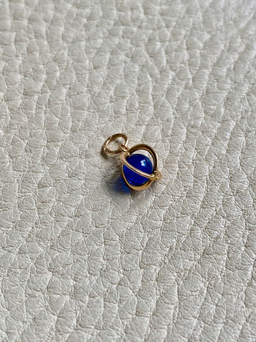 18k gold caged blue stone pendant or charm