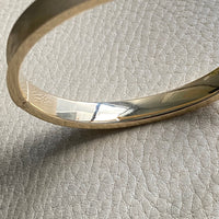 A beauty! 14k gold textured hinged bangle bracelet