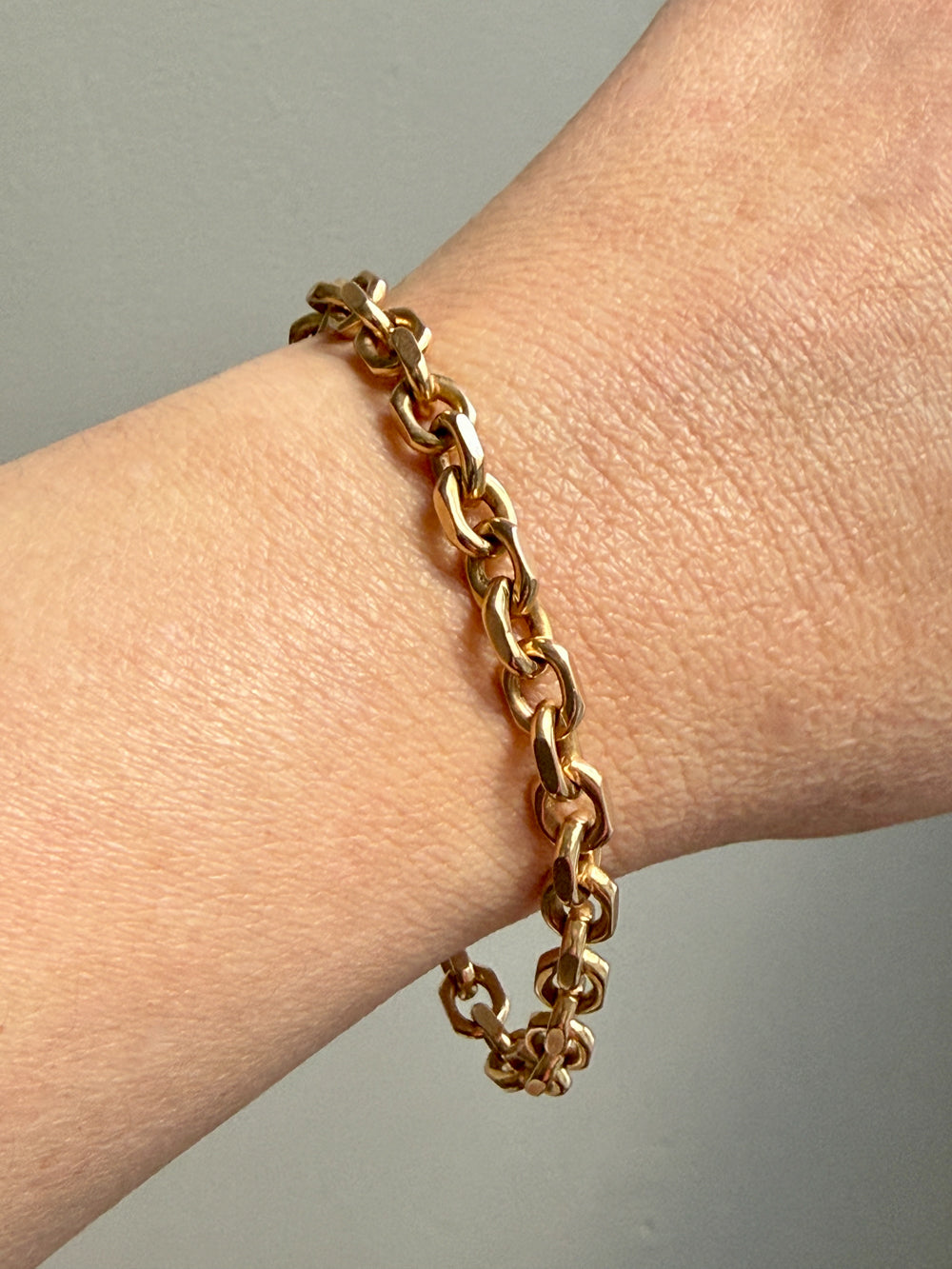 18k gold vintage biker link chain bracelet on wrist