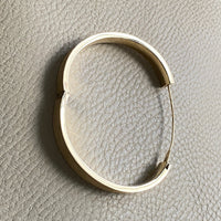 A beauty! 14k gold textured hinged bangle bracelet