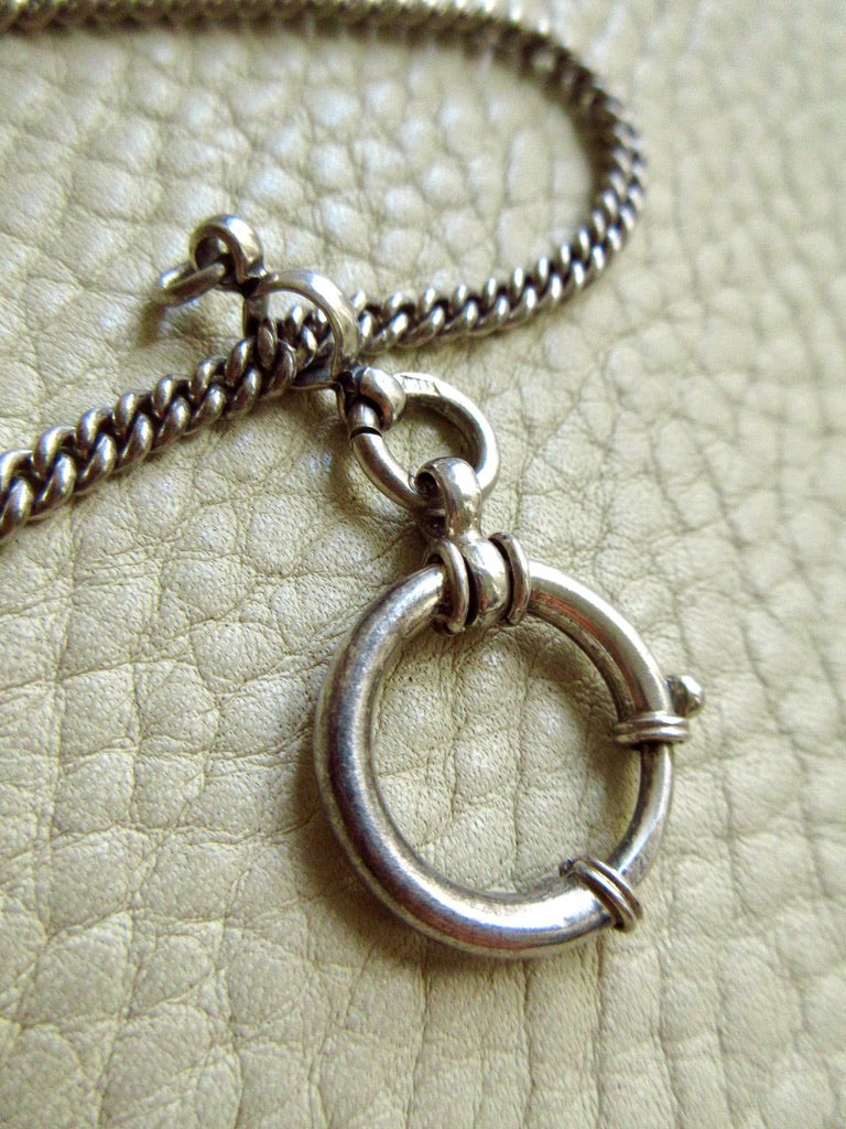 Vintage Scandinavian Silver Curb Link Watch Chain – 17.5 Inch Length on beige background