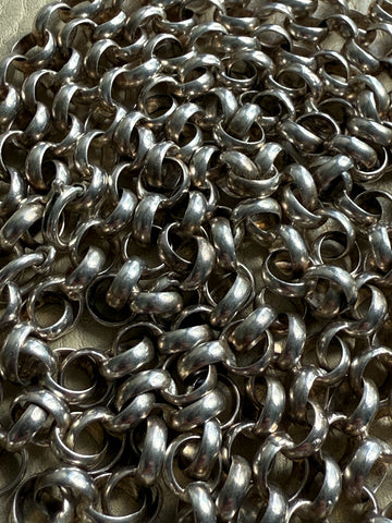 Close-up of a pile of silver chain links