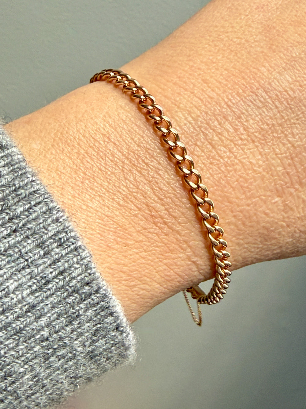 antique 18k Rose gold chain bracelet on a wrist