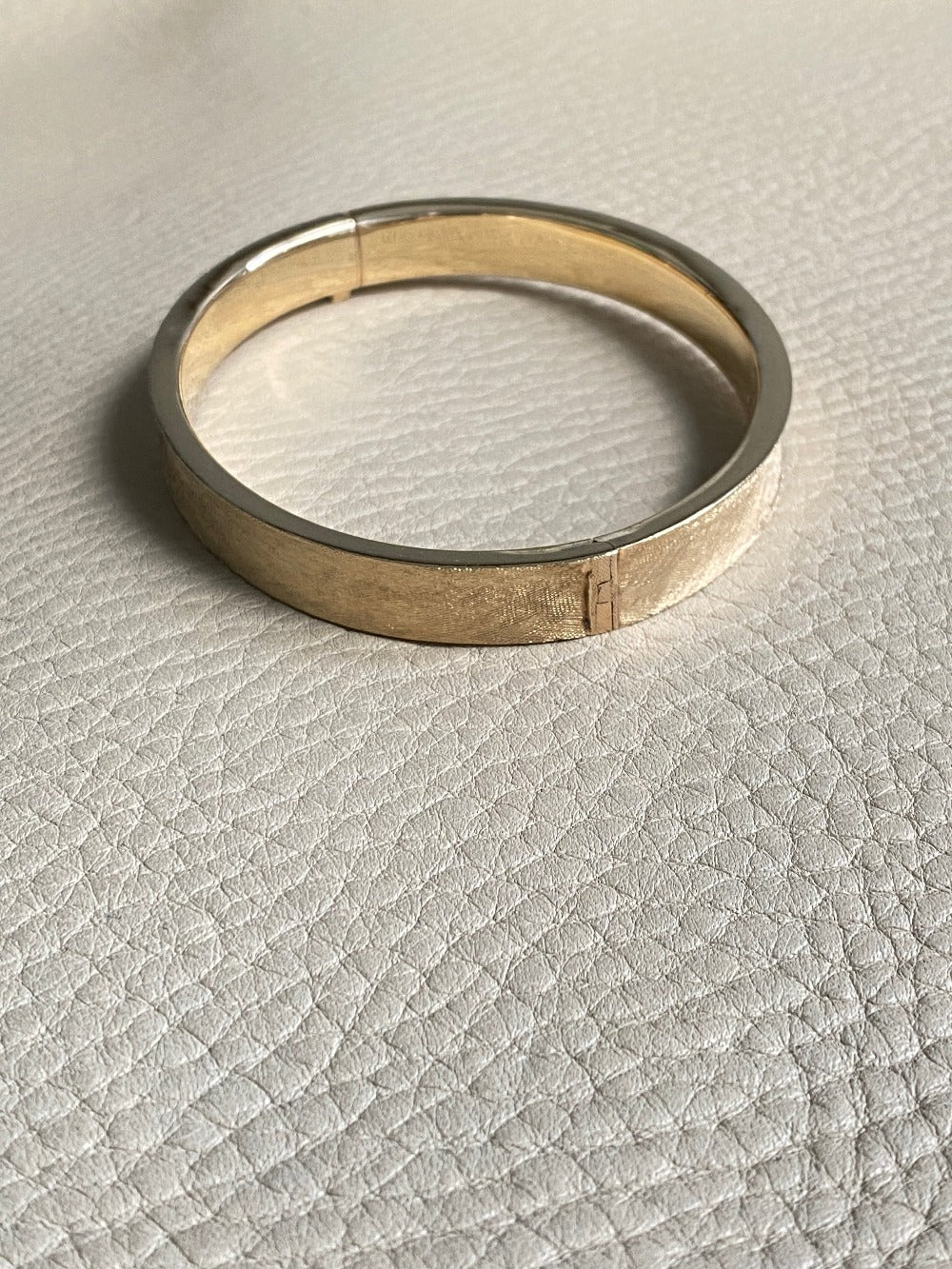 A beauty! 14k gold textured hinged bangle bracelet