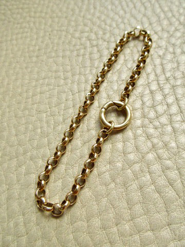Vintage Gold Rolling Chain Bracelet 14k – 6.7 Inch Length on beige background