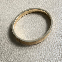 A beauty! 14k gold textured hinged bangle bracelet