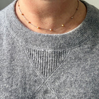 platinum and pearl french antique necklace on person