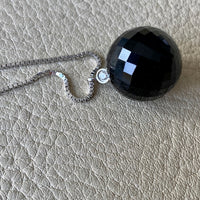 Brilliant! Black onyx faceted orb pendant necklace set in 18k white gold with 0.05 ct brilliant cut diamond by Ole Lynggaard