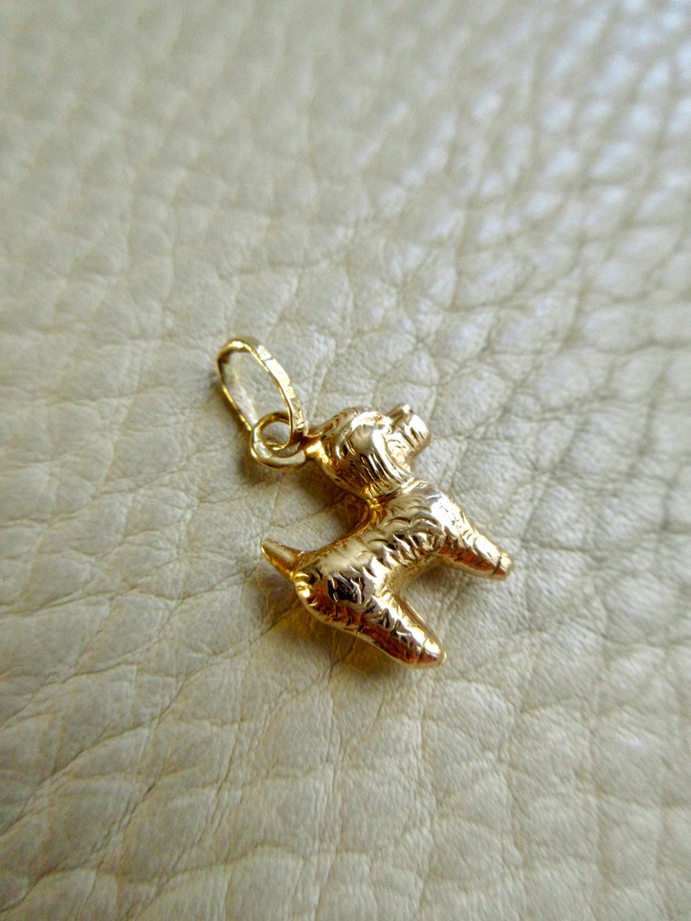 18k gold curly haired dog - poodle, doodle -  pendant or charm - 0.9 inch on beige background