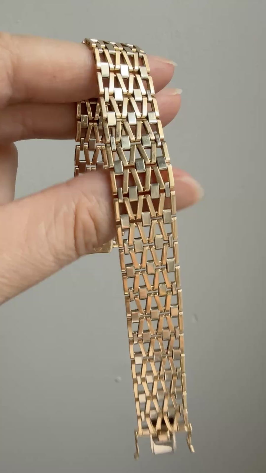 Mixed gold link bracelet in hand. Penelope Penelope Vintage Gold Jewelry