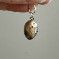 Victorian era Antique Egg Pendant in 10k Gold with Paste Stones