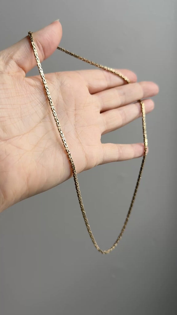 14k gold Gold byzantine chain necklace in hand penelopepenelope.com fine jewelry