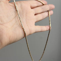 14k gold Gold byzantine chain necklace in hand penelopepenelope.com fine jewelry