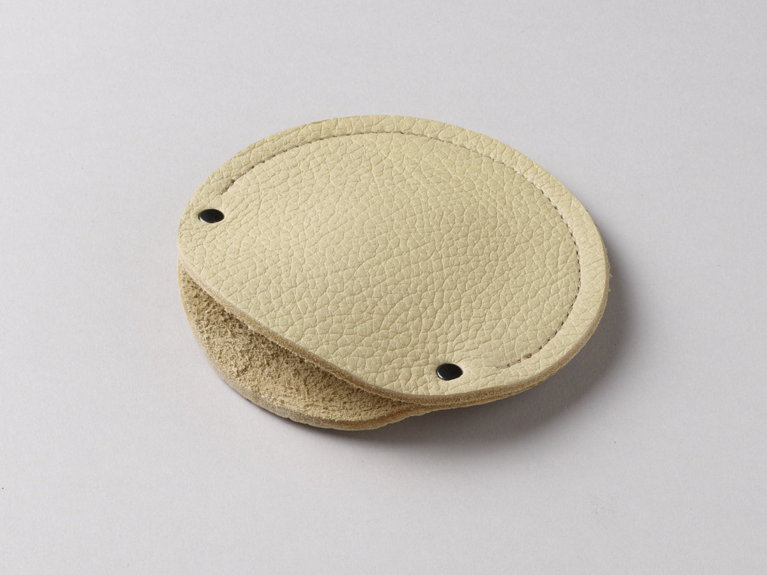 Cream leather circular cable case